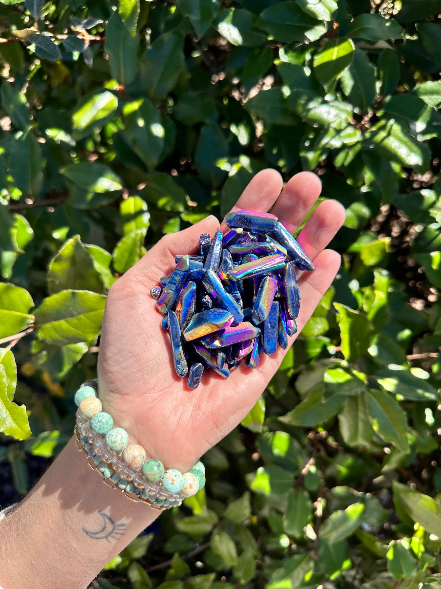 TITANIUM RAINBOW AURA QUARTZ MINI POINT