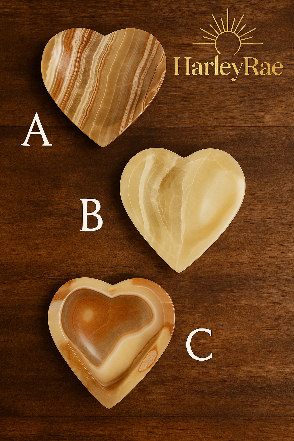 Three heart-shaped wooden trivets labeled A, B, and C on a wooden background with HarleyRae branding.